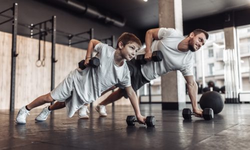 Healthy,Family,Concept.,Father,Trainer,And,Teenager,Son,Training,With