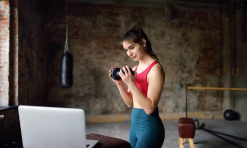 young-woman-workout-by-laptop-online-fitness-coach-workout-club-trainer-video-sport-class-social_t20_1nX4Yv-1536x1024